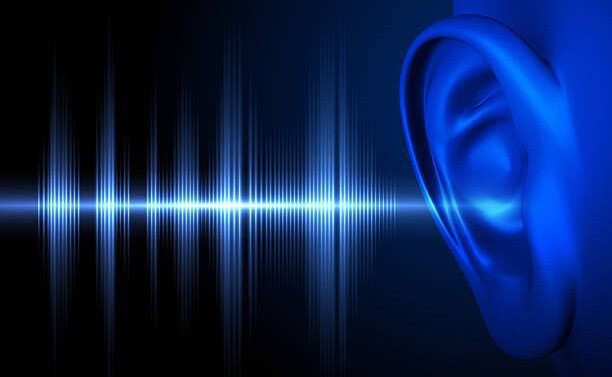 Illustration of an ear and sound waves